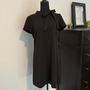 COPY - Vince Camuto black shift dress with bow neckline.
